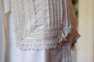 Detail of a frills and pleats on a white shroud