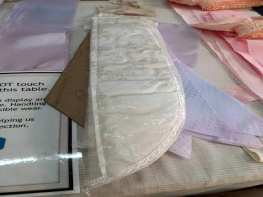 a white piece of quilted fabric